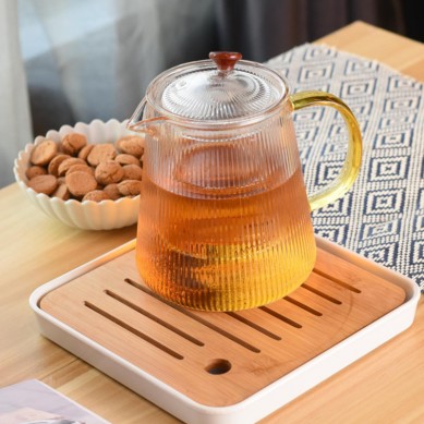 China stellt Teekanne für Blooming Tea Flowering Tea Pot mit 4 Stück Teetassen-Geschenkset her