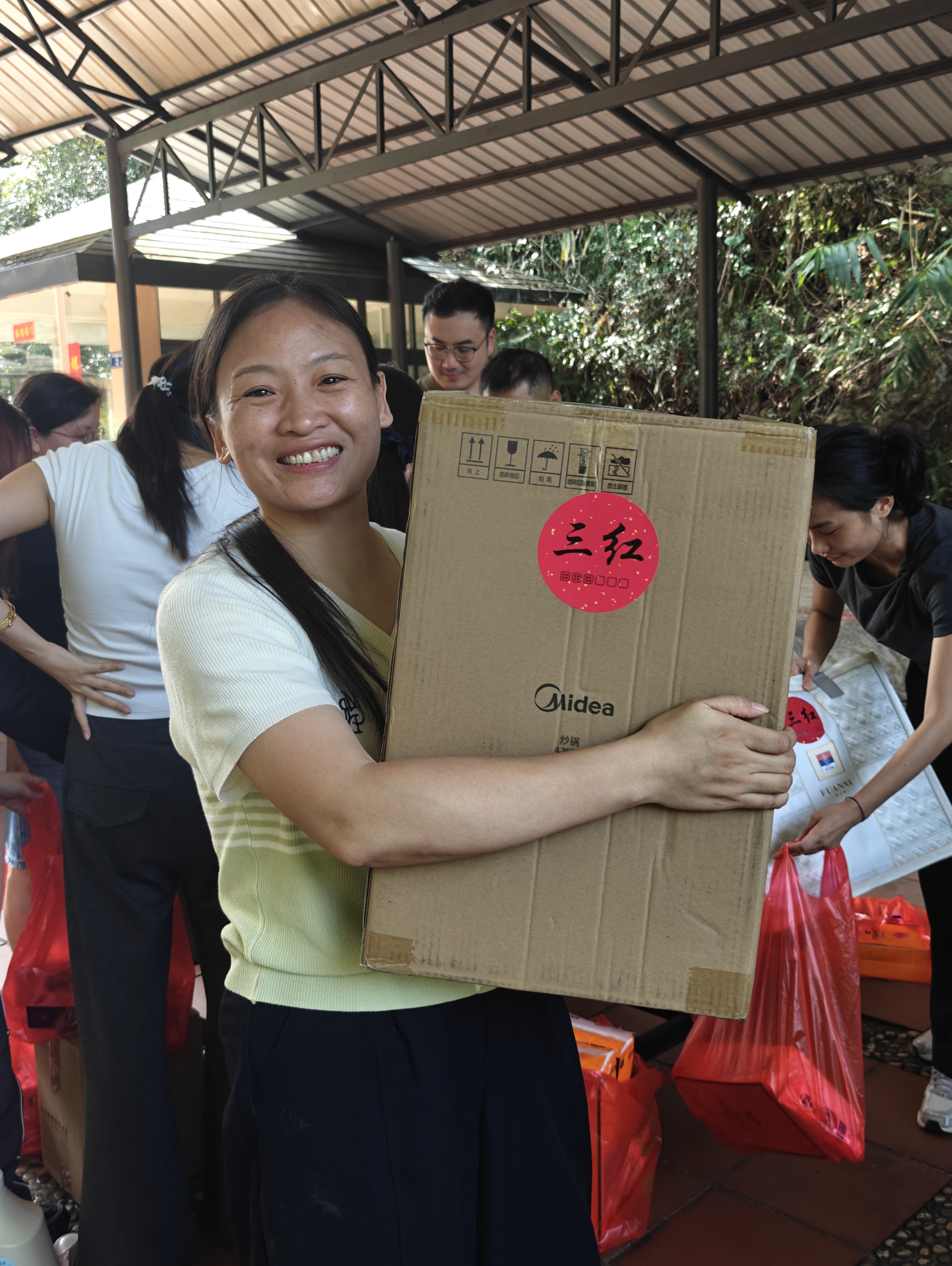 SHUNSTONE team member with a Bo Bing prize during Mid-Autumn Festival