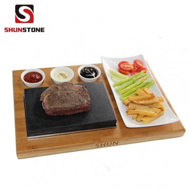 Amazon top seller Steak Stone Set  Bamboo Board Black Lava Rock Sizzling Hot Plate