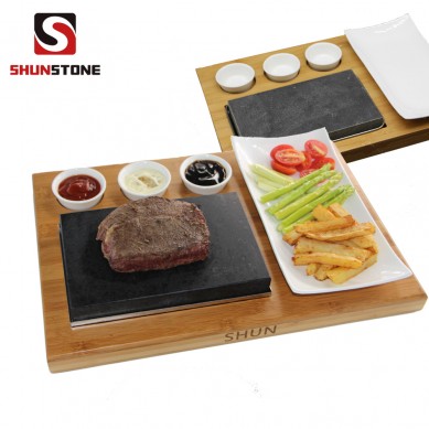 Amazon top seller Steak Stone Set  Bamboo Board Black Lava Rock Sizzling Hot Plate